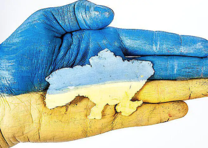 a hand in the colours of the Ukrainian flag