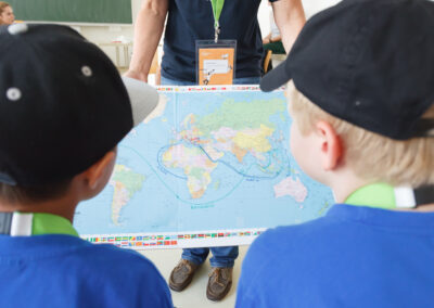 Vienna Children's University students with world map