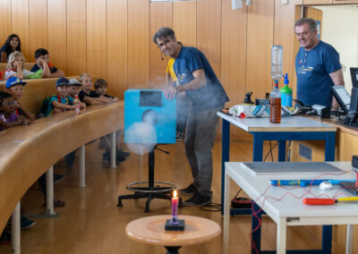 Blowing out candles in a novel way, fun at the Vienna Children's University lecture